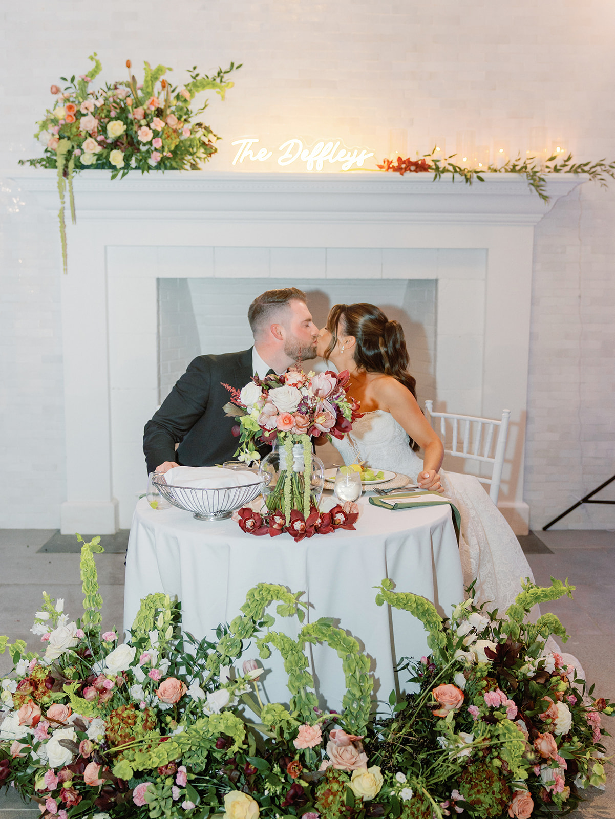 Wedding florals styled in a warm, romantic palette by Plant Girl Floral